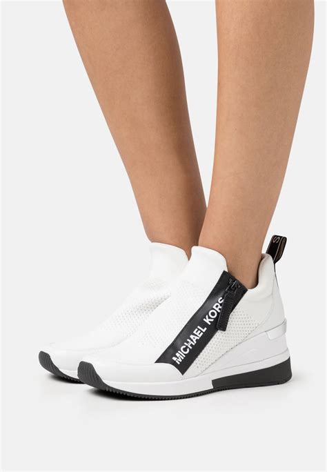 michael kors wedge sneaker white|michael kors black wedge sneakers.